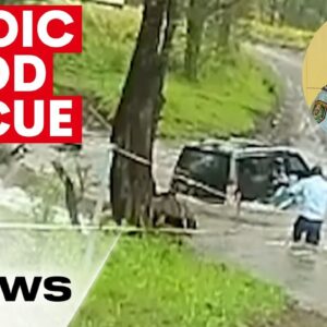 Cop saves three people from submerged vehicle  | 7NEWS