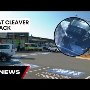 Security guard slashed with meat cleaver outside Westfield Helensvale | 7NEWS